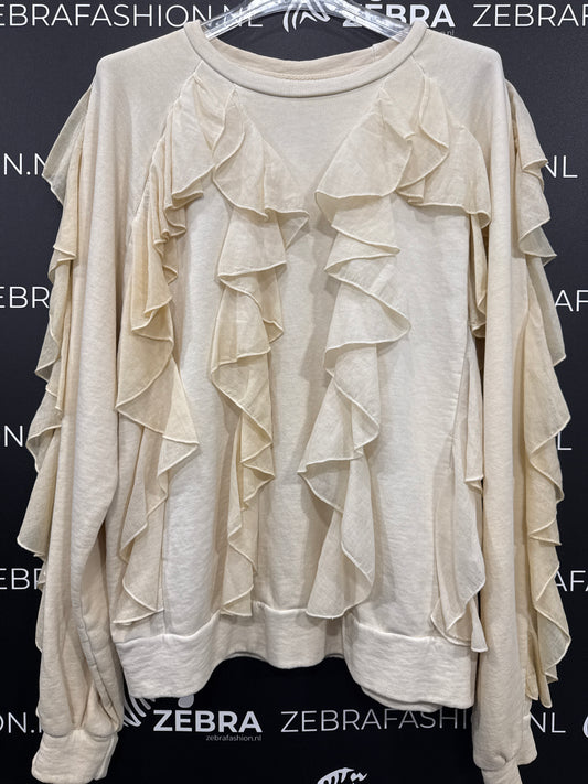 Tensione in sweater frange