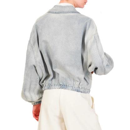 Tensione in jeans bomber