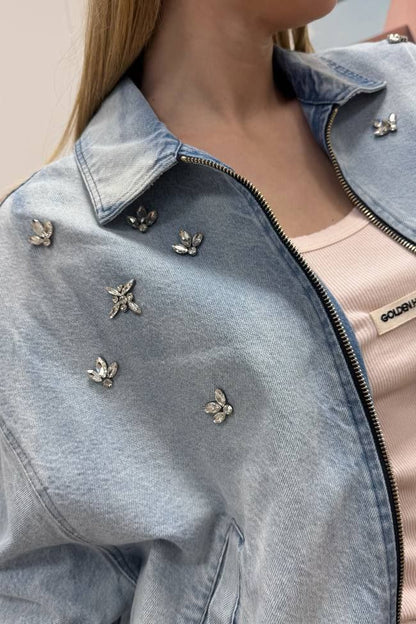 Tensione in jeans bomber