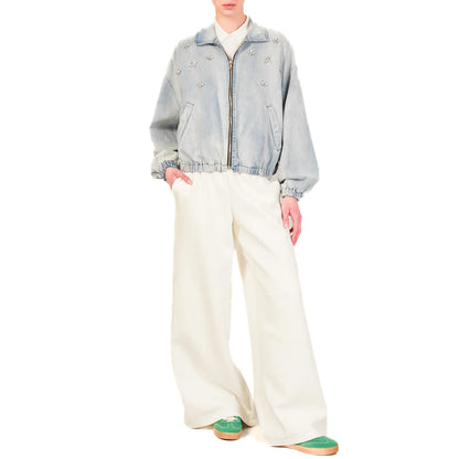 Tensione in jeans bomber