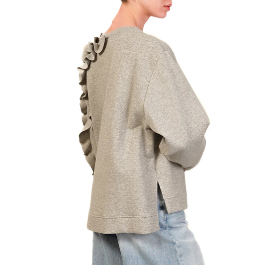 Tensione in sweater grigio